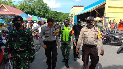 Tim Gabungan TNI,Polri dan Satpol PP Berikan Imbauan di Pasar Belantik Raya